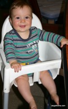 Asher in his highchair