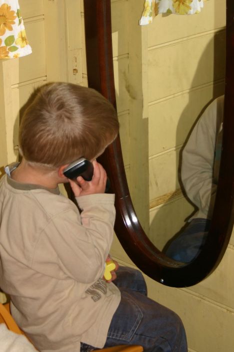 watching self on phone in mirror IMG_0327